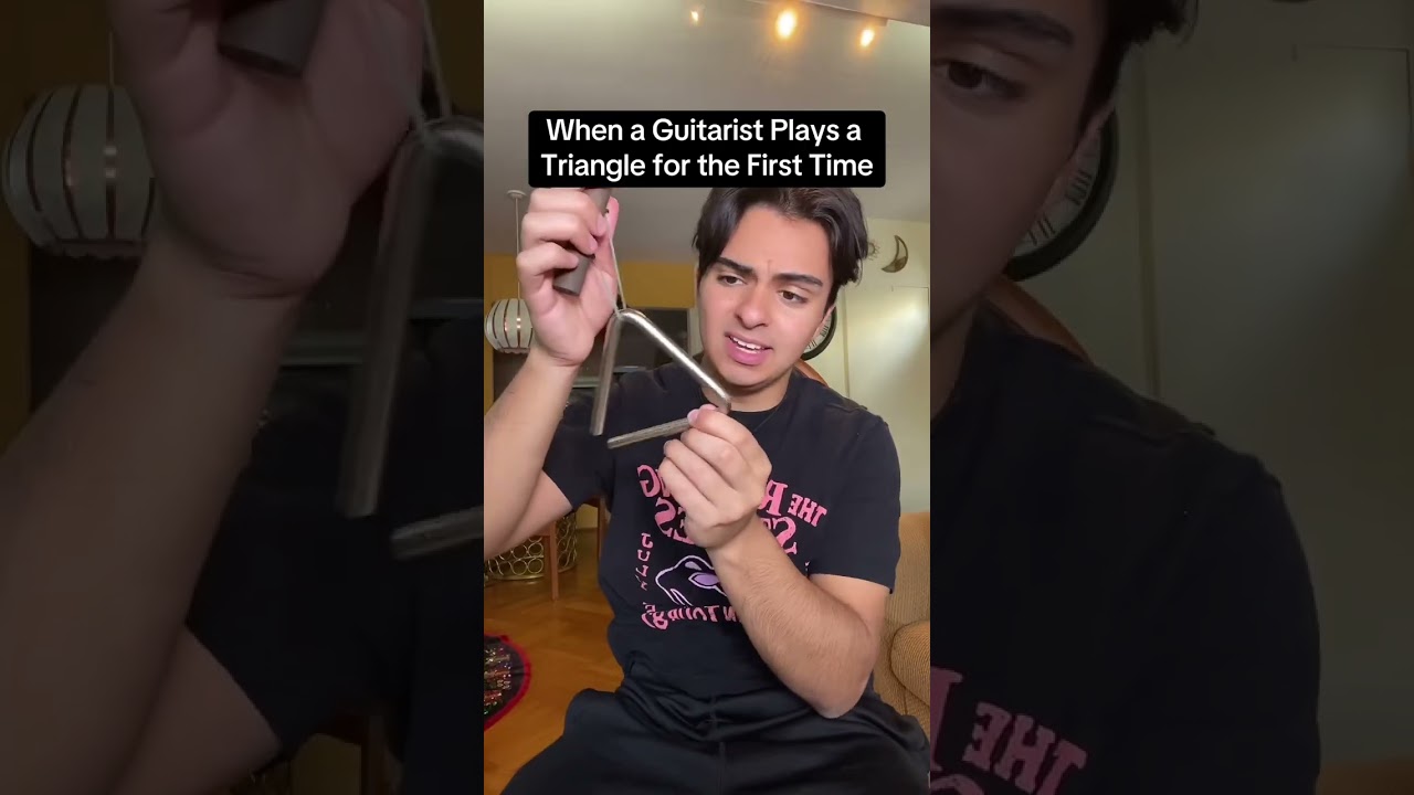 Triangle for Guitarists: A Satirical Survival Guide