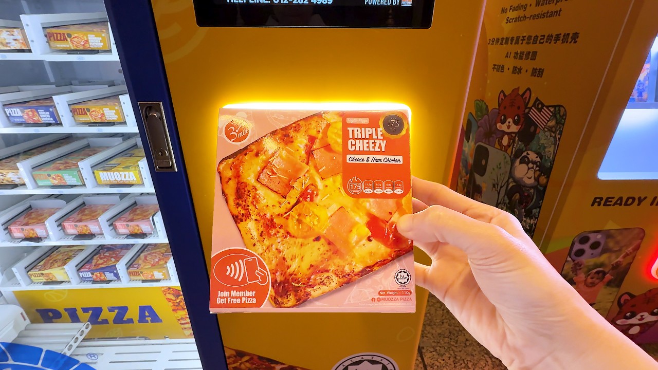 Malaysia's Pizza Vending Machine: Hot Slices in 79 Seconds?