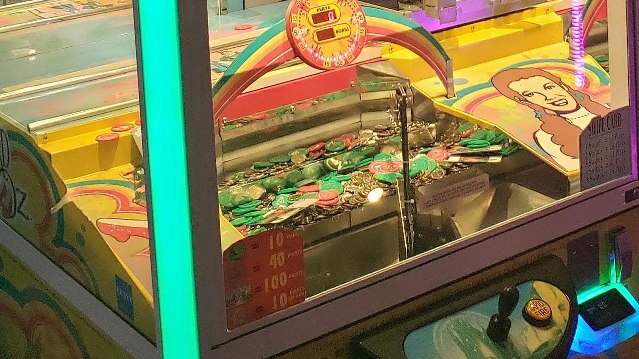 Master Wizard of Oz Coin Pusher: Win Cards & Jackpots